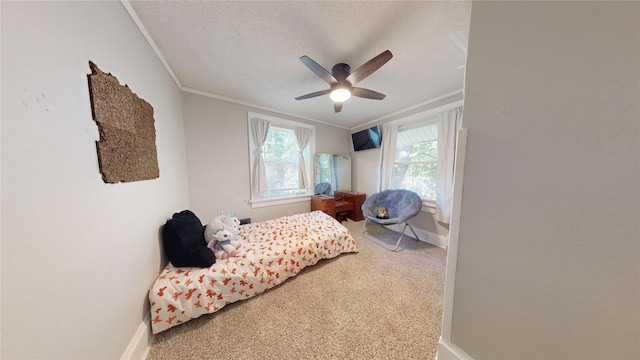 1725 Mondamin Ave, Des Moines, IA 50314 - bedroom with crown molding, carpet, a textured ceiling, and a ceiling fan