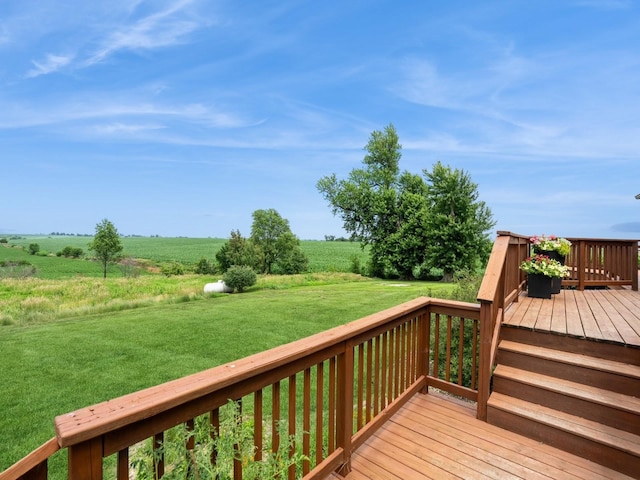 1246 N 75th Ave W, Newton, IA 50208 - wooden deck featuring a view of rural / pastoral area and a lawn