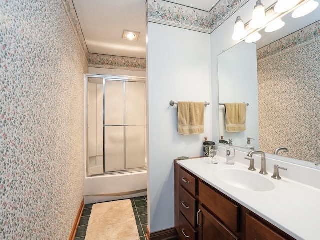 1246 N 75th Ave W, Newton, IA 50208 - full bathroom with vanity, tile patterned floors, enclosed tub / shower combo, and wallpapered walls