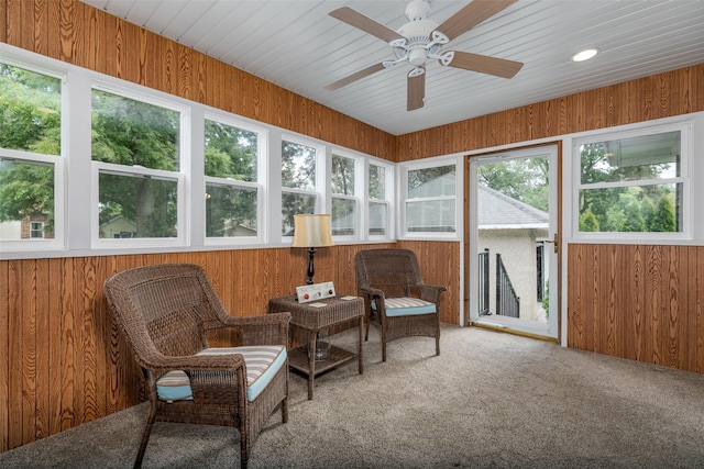 1412 Court St, Adel, IA 50003 - sunroom / solarium with wooden walls, ceiling fan, and carpet