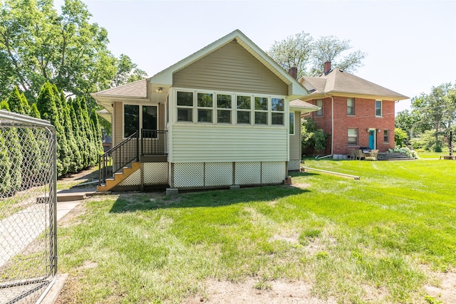 1412 Court St, Adel, IA 50003 - back of house with a yard