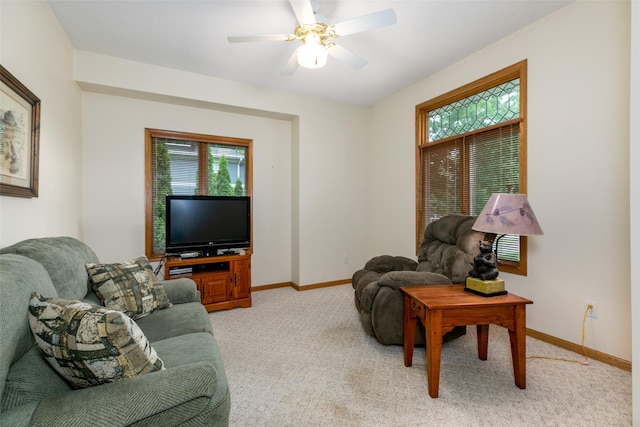 1412 Court St, Adel, IA 50003 - living area featuring light carpet and ceiling fan