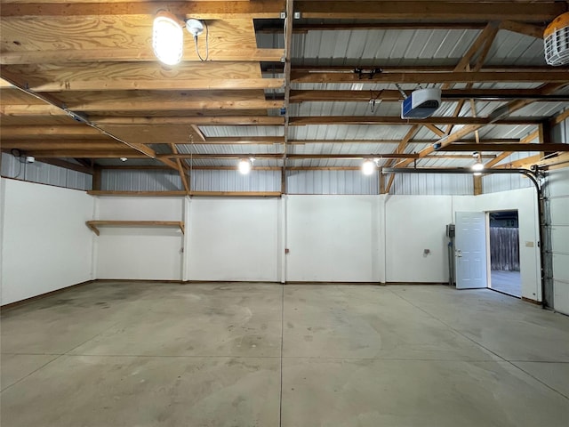 401 NW 50th Pl, Des Moines, IA 50313 - garage featuring a garage door opener