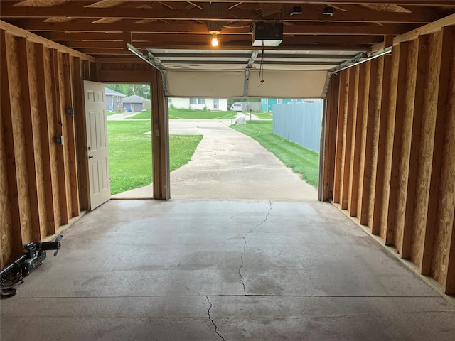 401 NW 50th Pl, Des Moines, IA 50313 - garage featuring a garage door opener