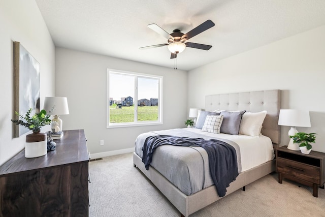 4422 NW Olivia Ln, Ankeny, IA 50023 - bedroom featuring light colored carpet and ceiling fan