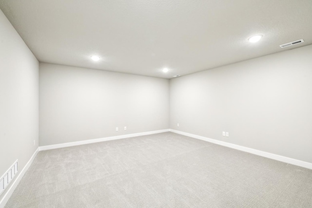 4422 NW Olivia Ln, Ankeny, IA 50023 - carpeted spare room with recessed lighting