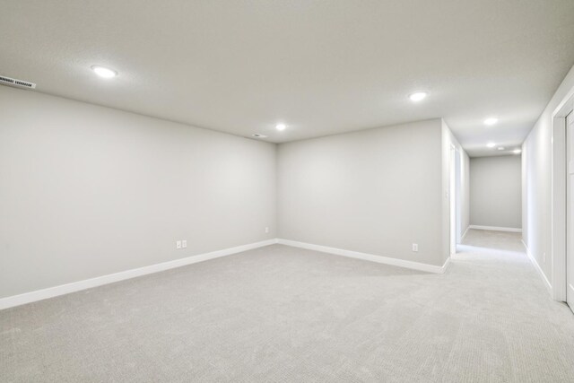 4422 NW Olivia Ln, Ankeny, IA 50023 - finished basement with light colored carpet and recessed lighting