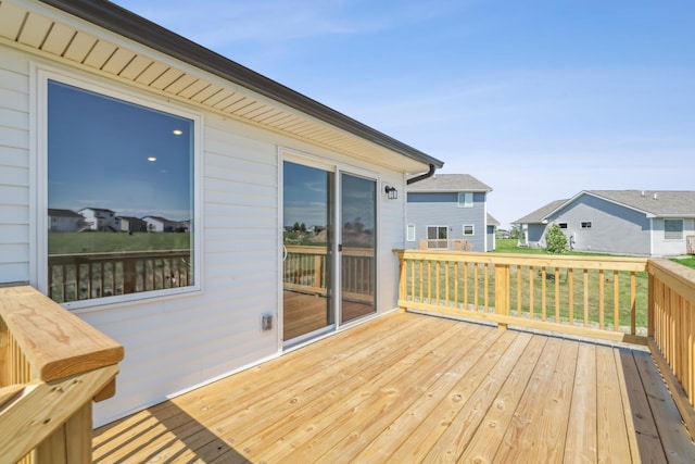 4422 NW Olivia Ln, Ankeny, IA 50023 - wooden deck with a residential view