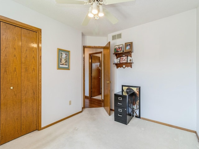 1907 Thornton Ct, Des Moines, IA 50320 - bedroom with light colored carpet and ceiling fan