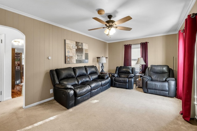 228 Hillside Ave, West Des Moines, IA 50265 - living area featuring ornamental molding, arched walkways, carpet floors, and ceiling fan