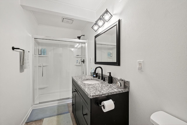228 Hillside Ave, West Des Moines, IA 50265 - full bathroom with a stall shower, vanity, and ornamental molding