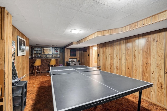 228 Hillside Ave, West Des Moines, IA 50265 - game room with wooden walls, a dry bar, and carpet floors