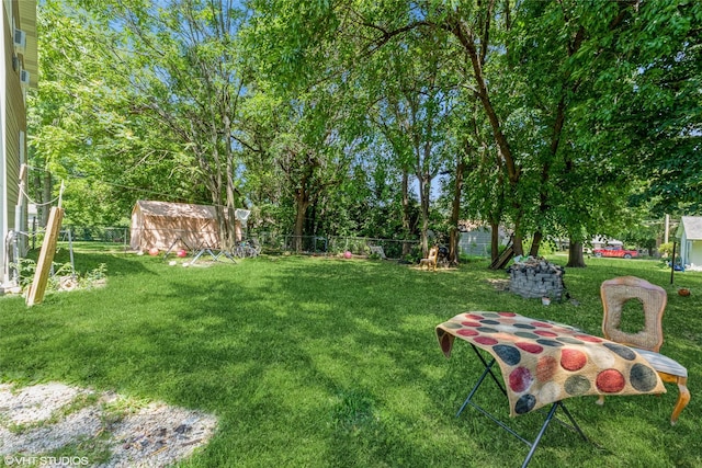 4131 55th St, Des Moines, IA 50310 - fenced backyard featuring a storage shed