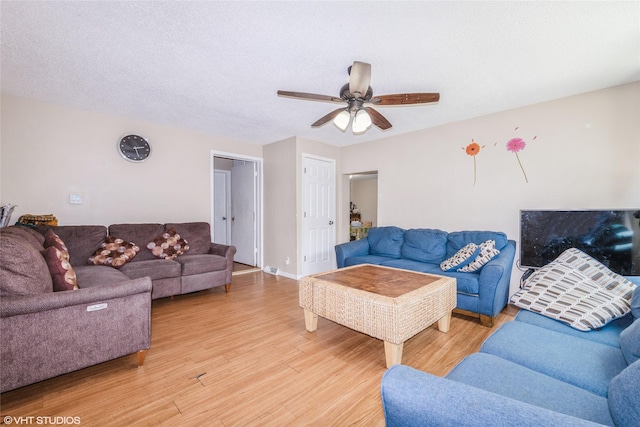 4131 55th St, Des Moines, IA 50310 - living room featuring light wood-style flooring and ceiling fan