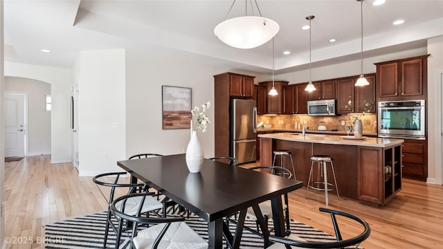 2811 SW Westview Ln, Ankeny, IA 50023 - dining area featuring light wood-style flooring and recessed lighting