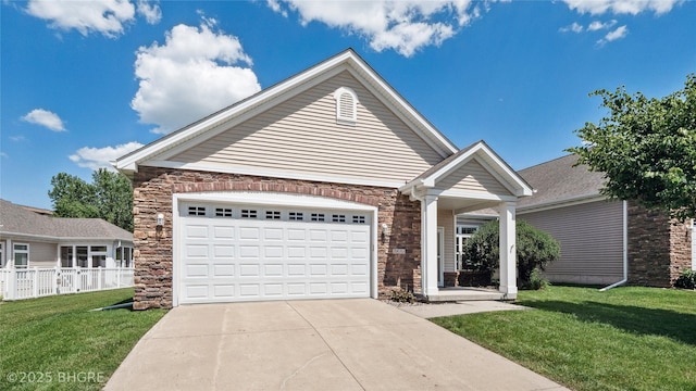 2811 SW Westview Ln, Ankeny, IA 50023 - ranch-style house featuring concrete driveway, stone siding, and an attached garage