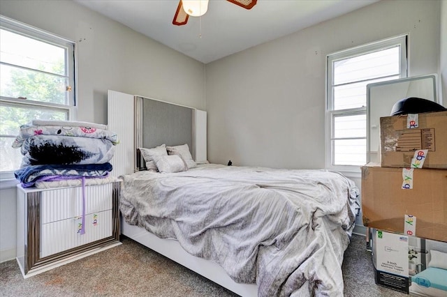 2721 E 16th St, Des Moines, IA 50316 - carpeted bedroom with a ceiling fan