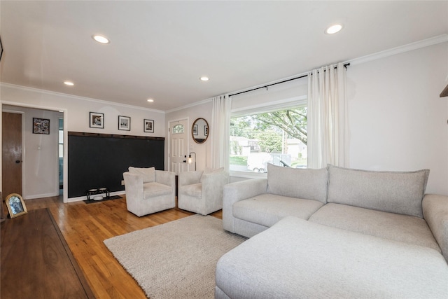 804 24th St, West Des Moines, IA 50265 - living room with ornamental molding, recessed lighting, and wood finished floors