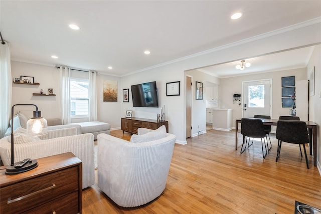 804 24th St, West Des Moines, IA 50265 - living room featuring light wood-style floors, crown molding, and recessed lighting