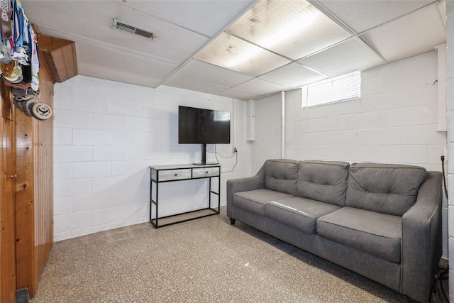 804 24th St, West Des Moines, IA 50265 - living area featuring concrete block wall