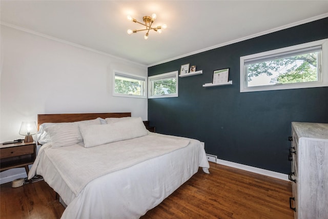 804 24th St, West Des Moines, IA 50265 - bedroom featuring a chandelier, wood finished floors, a baseboard heating unit, and crown molding