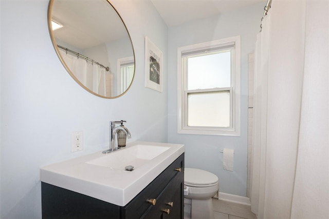 804 24th St, West Des Moines, IA 50265 - bathroom with vanity and tile patterned flooring