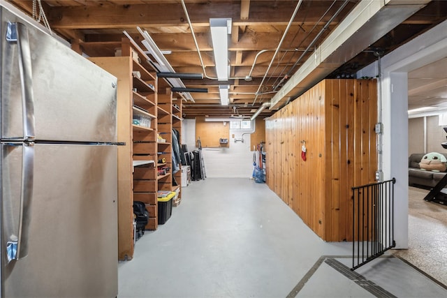 804 24th St, West Des Moines, IA 50265 - below grade area featuring freestanding refrigerator