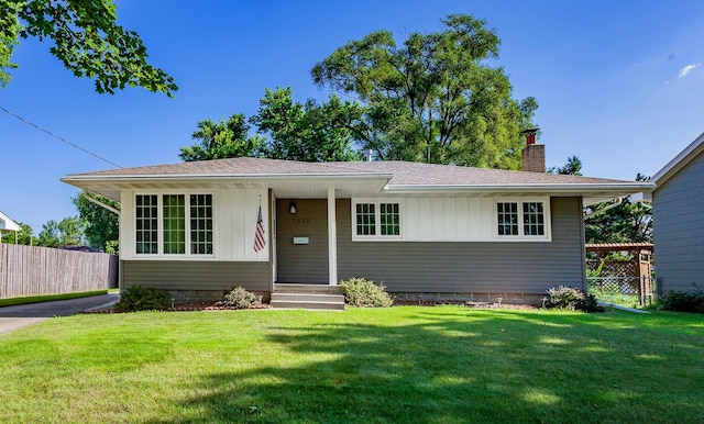1022 Trisha Ave, Des Moines, IA 50313 - view of front of house with a chimney