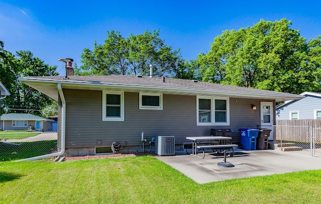 1022 Trisha Ave, Des Moines, IA 50313 - rear view of property featuring a patio area and a chimney