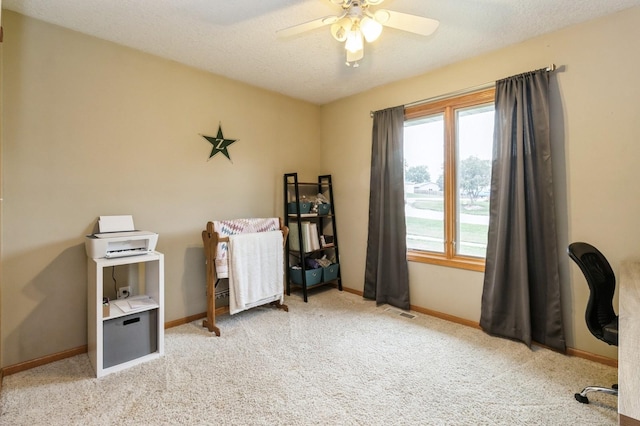 308 S 3rd St, Milo, IA 50166 - carpeted office with ceiling fan and baseboards