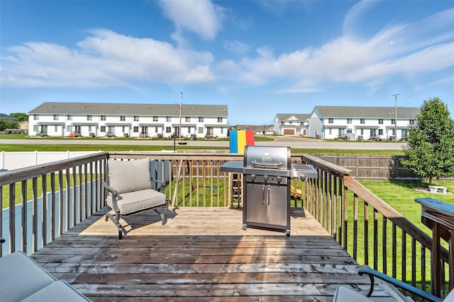 716 James St NE, Bondurant, IA 50035 - deck with grilling area, a residential view, and a fenced backyard