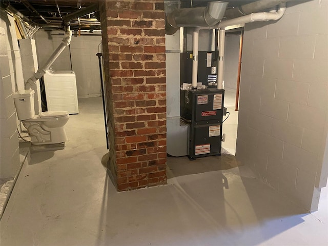 2615 59th St, Des Moines, IA 50322 - utility room featuring washer / dryer and heating unit