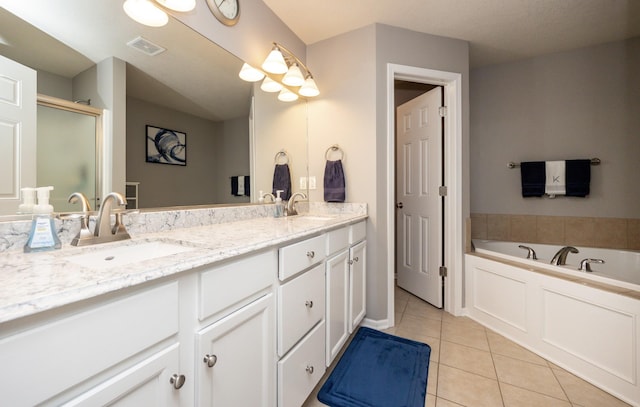 4104 SW 2nd St, Ankeny, IA 50023 - bathroom featuring tile patterned floors, double vanity, a bath, and a shower with door