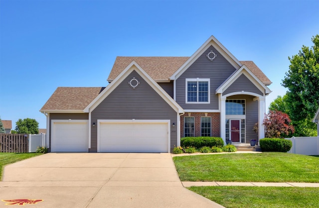 4104 SW 2nd St, Ankeny, IA 50023 - view of front of house featuring an attached garage, concrete driveway, and a shingled roof