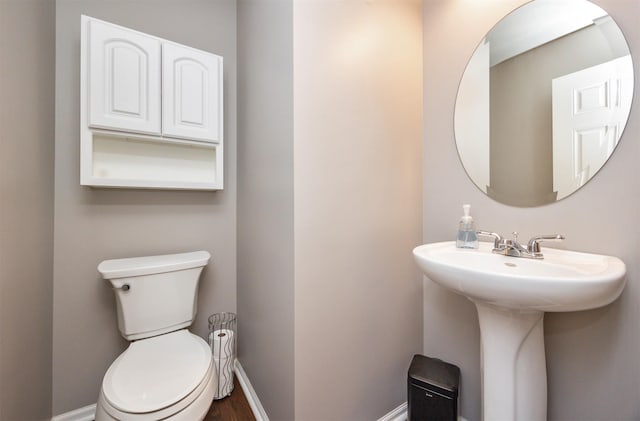 4104 SW 2nd St, Ankeny, IA 50023 - half bathroom with toilet and baseboards