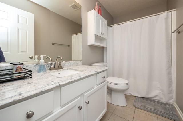 4104 SW 2nd St, Ankeny, IA 50023 - bathroom featuring tile patterned flooring and vanity