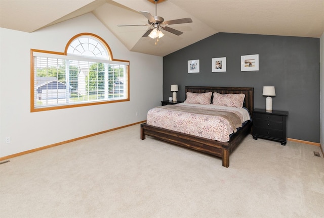 705 Patterson Dr, Carlisle, IA 50047 - bedroom with light colored carpet, lofted ceiling, and ceiling fan