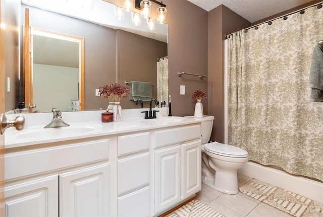 705 Patterson Dr, Carlisle, IA 50047 - full bath featuring tile patterned flooring, double vanity, and a shower with shower curtain