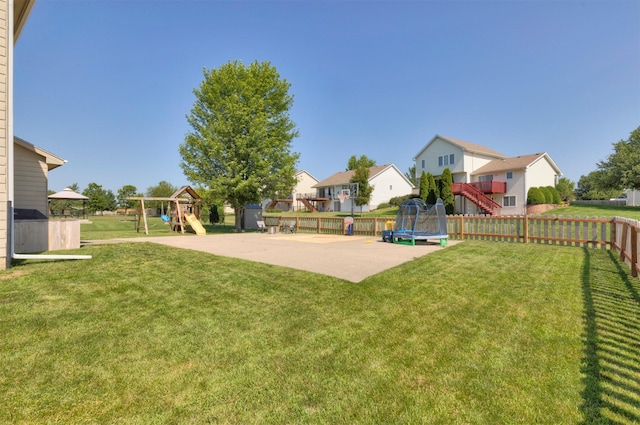 705 Patterson Dr, Carlisle, IA 50047 - view of yard featuring a playground, a trampoline, a patio, and a residential view