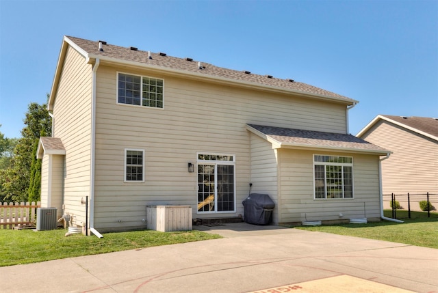 705 Patterson Dr, Carlisle, IA 50047 - back of property featuring a patio
