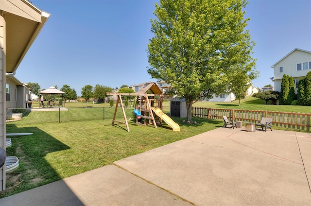 705 Patterson Dr, Carlisle, IA 50047 - fenced backyard with a shed, a playground, a patio, and a gazebo