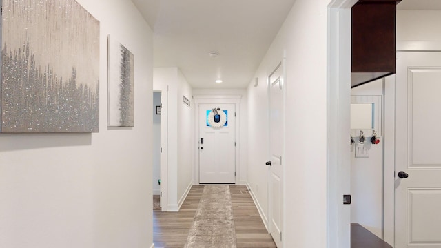 5453 Rowling Dr, Ames, IA 50014 - corridor with wood finished floors and recessed lighting