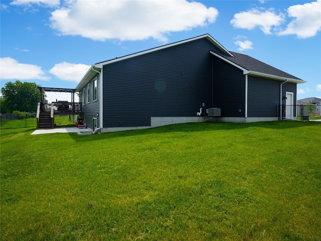 5453 Rowling Dr, Ames, IA 50014 - rear view of house featuring a wooden deck and stairway