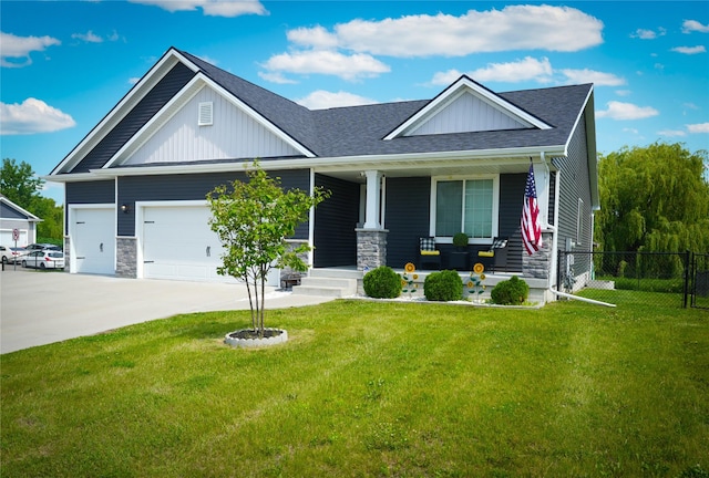5453 Rowling Dr, Ames, IA 50014 - craftsman-style home featuring covered porch, board and batten siding, driveway, and a shingled roof