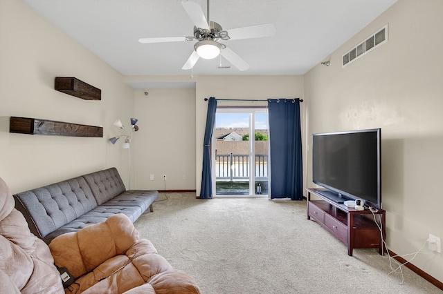 10320 Norfolk Dr Unit 7, Johnston, IA 50131 - living area featuring light carpet and a ceiling fan