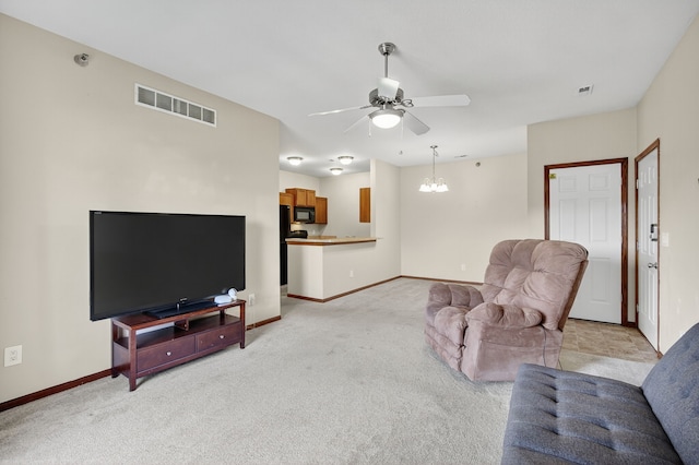 10320 Norfolk Dr Unit 7, Johnston, IA 50131 - living room featuring ceiling fan, a chandelier, and light colored carpet
