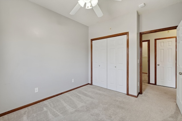 10320 Norfolk Dr Unit 7, Johnston, IA 50131 - unfurnished bedroom with light carpet, a closet, and a ceiling fan