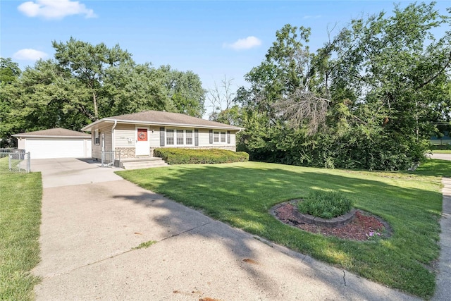 3520 E 32nd St, Des Moines, IA 50317 - view of front of property with an outdoor structure, a front lawn, a detached garage, and stone siding