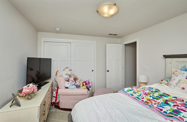 16621 Goodman Dr, Urbandale, IA 50323 - bedroom with light colored carpet and a closet