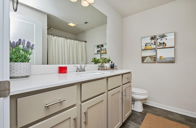 16621 Goodman Dr, Urbandale, IA 50323 - bathroom featuring vanity and wood finished floors